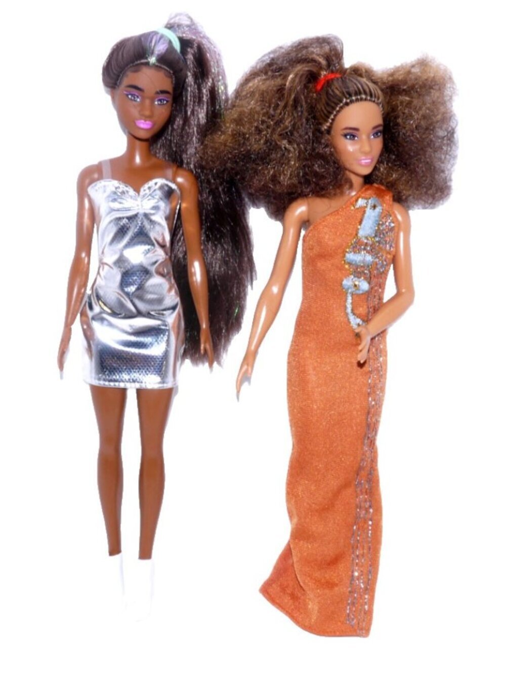 Barbie set of two dolls clothes do not match dolls and some may be vintage As Is